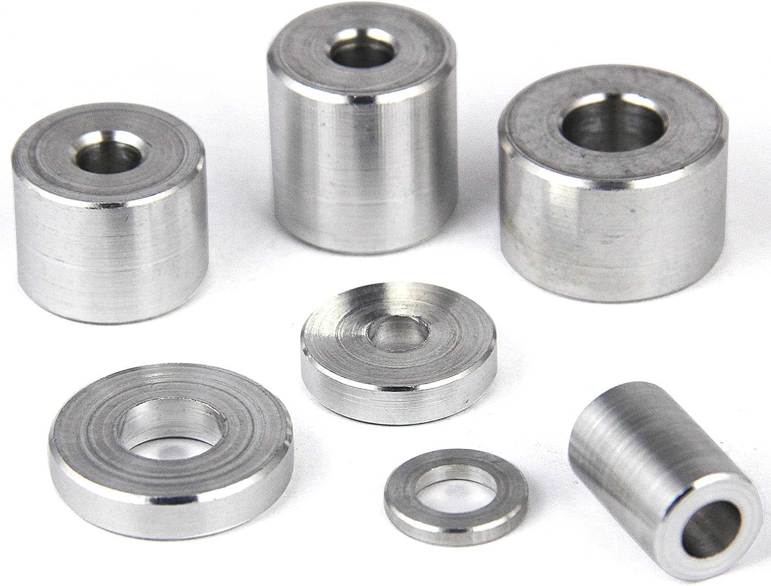 Aluminum sleeves by multi-station cold forming